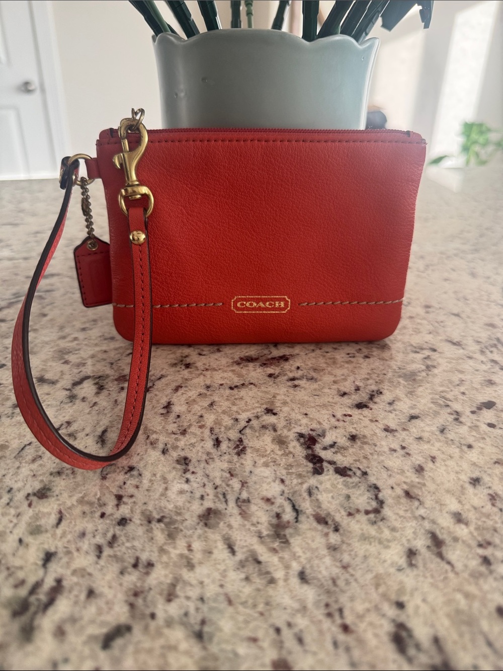Coach Orange/Peach Leather Wristlet with Gold-Tone Details